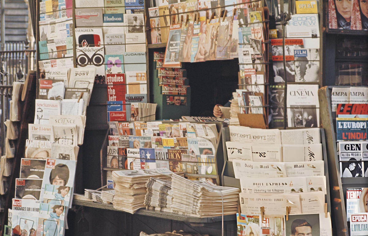 Foreign Language Newspapers And Magazines At A Newsstand, New York, 1966.
