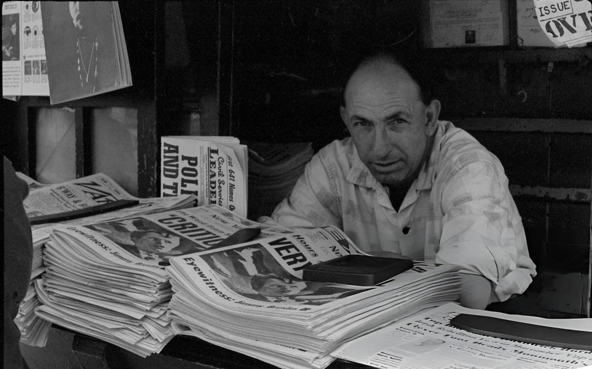 News Seller At A Stand With Papers Reporting The Shooting Of Robert Kennedy, New York, 1968.