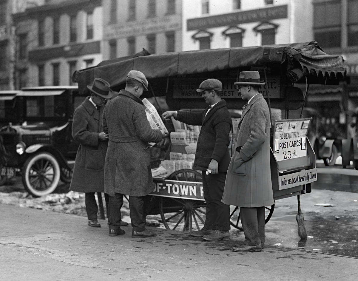 New Yorkers At A Newsstand During A Morning Ritual Of Reading The Paper, 1925.