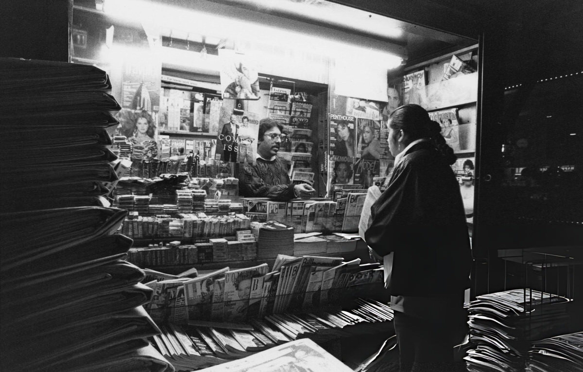 Man Selling Magazines And Newspapers From A Newsstand, New York, 1988.