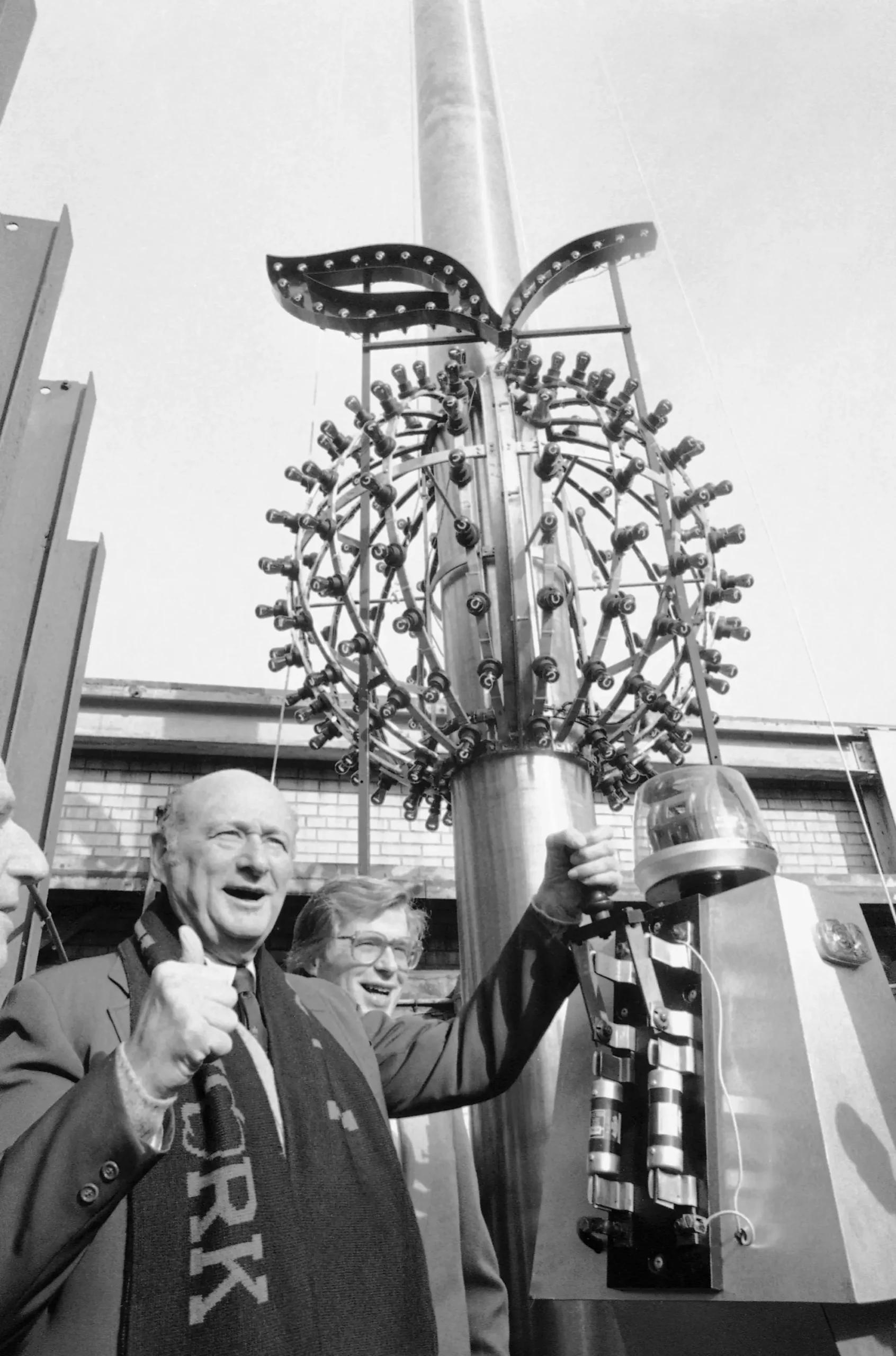 New York City Mayor Ed Koch Gives The Thumbs-Up Sign As He Flips A Switch To Test The Big Apple Ball In 1981. That Was Also The Final Year Russ Brown, The Superintendent Of One Times Square, Managed The Ball Dropping After 16 Years.