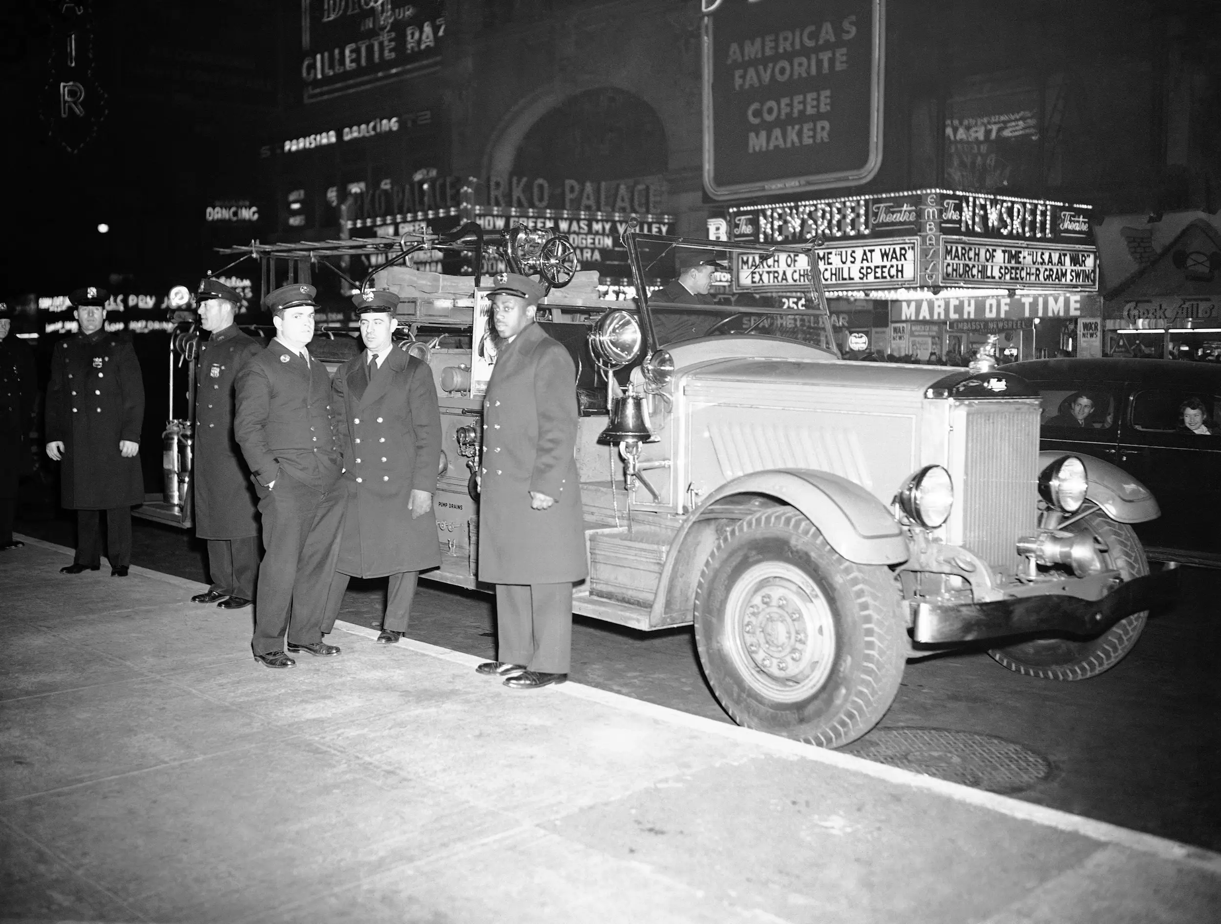 New York'S Fire Department In Times Square On December 31, 1941. Instead Of A Ball Drop, Crowds Gathered In 1942 And '43 Rang In The New Year With A Minute Of Silence Followed By The Sound Of Chimes Played From A Sound Truck At The Base Of The Times Tower, A Nod To The Original New Year'S Celebration At Trinity Church.