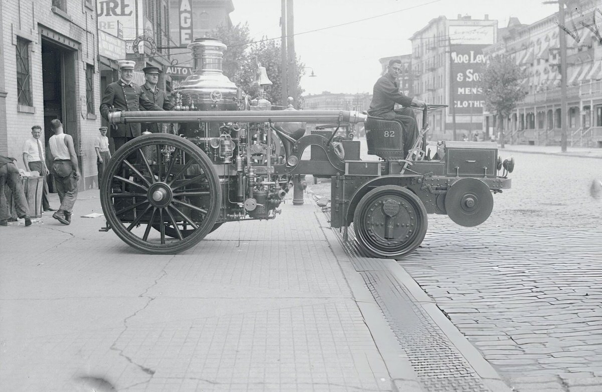 Fire Chief And Firefighters With Their Engines Outside A Manhattan Firehouse.