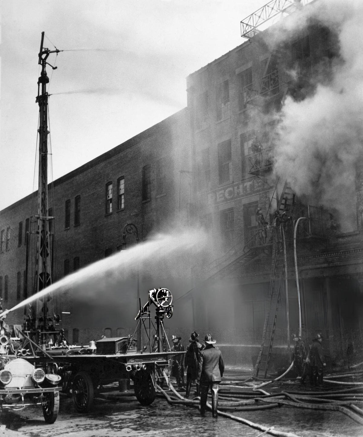 Firefighters Battling A Blaze At The Pechter Bakery At 468 Cherry Street, New York, 1938.