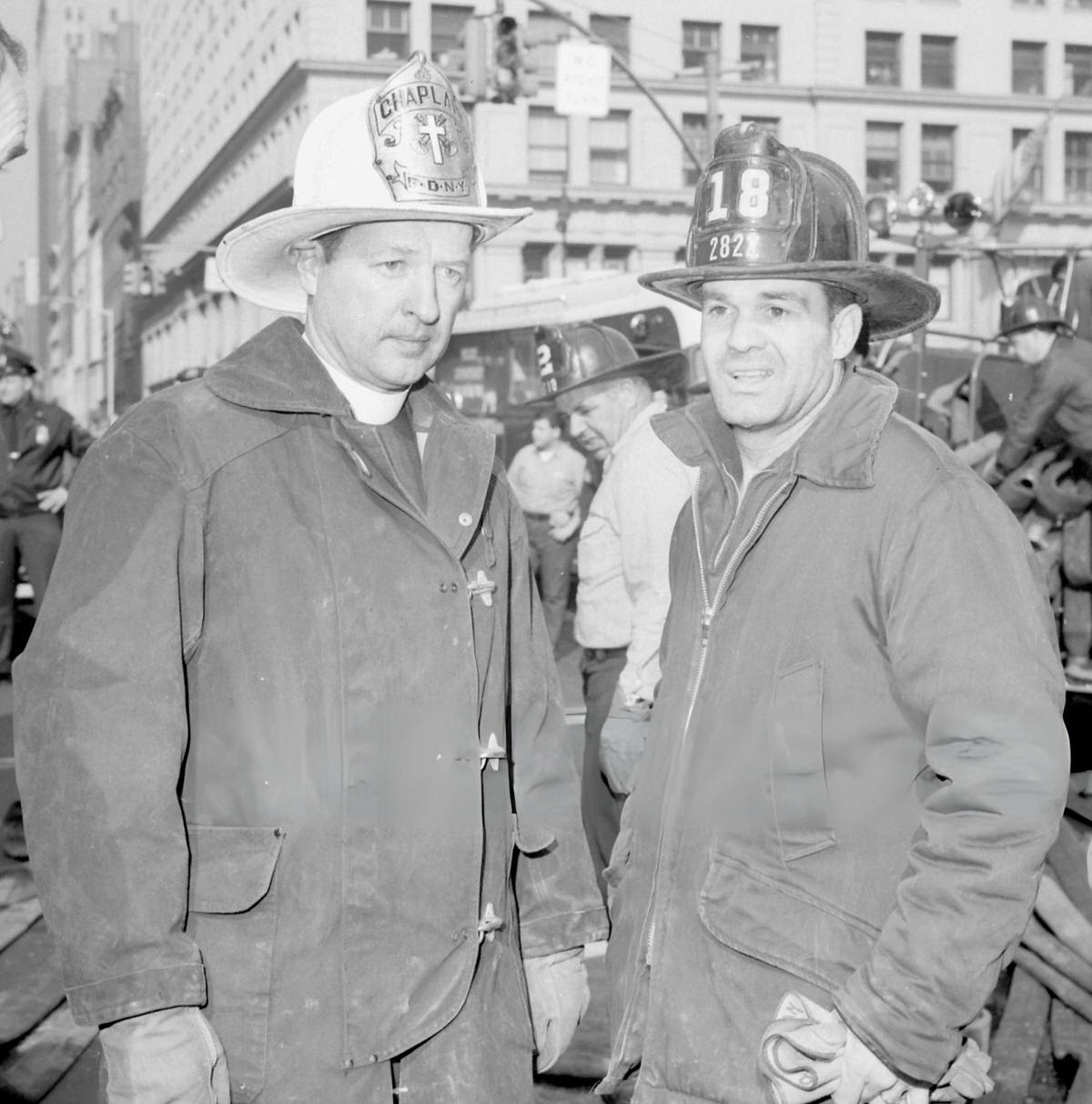 Chaplain Frederick Eckhart Speaking With A Firefighter After A Blaze At 6 East 23Rd Street Killed 12 Firemen, New York, 1966.