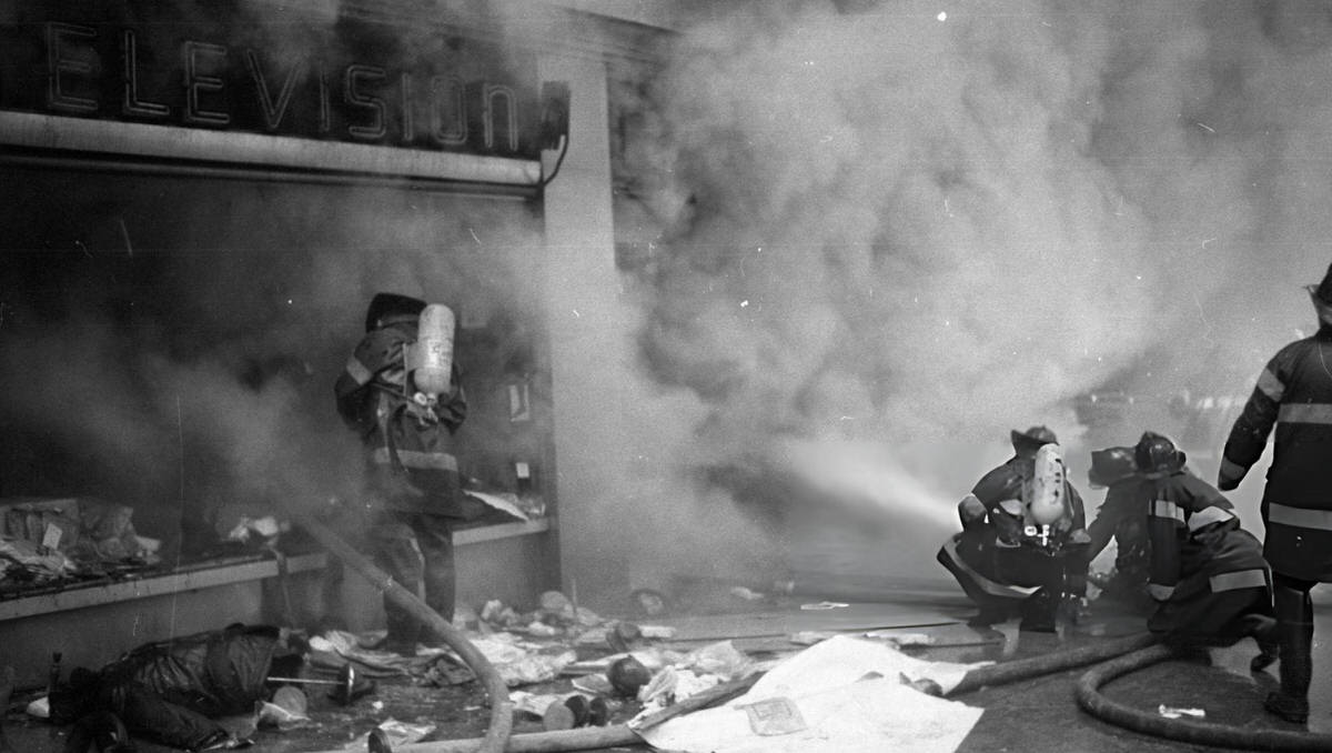 Firefighters Working To Extinguish A Five-Alarm Fire At The Commodore Hotel, New York, 1972.