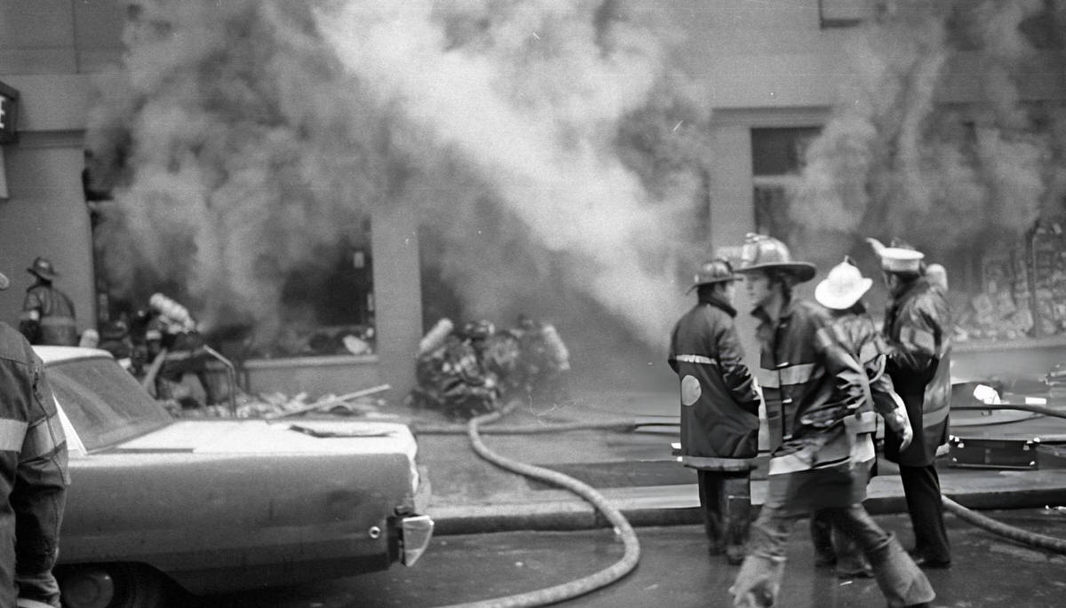 Firefighters Working To Extinguish A Five-Alarm Fire At The Commodore Hotel, New York, 1972.