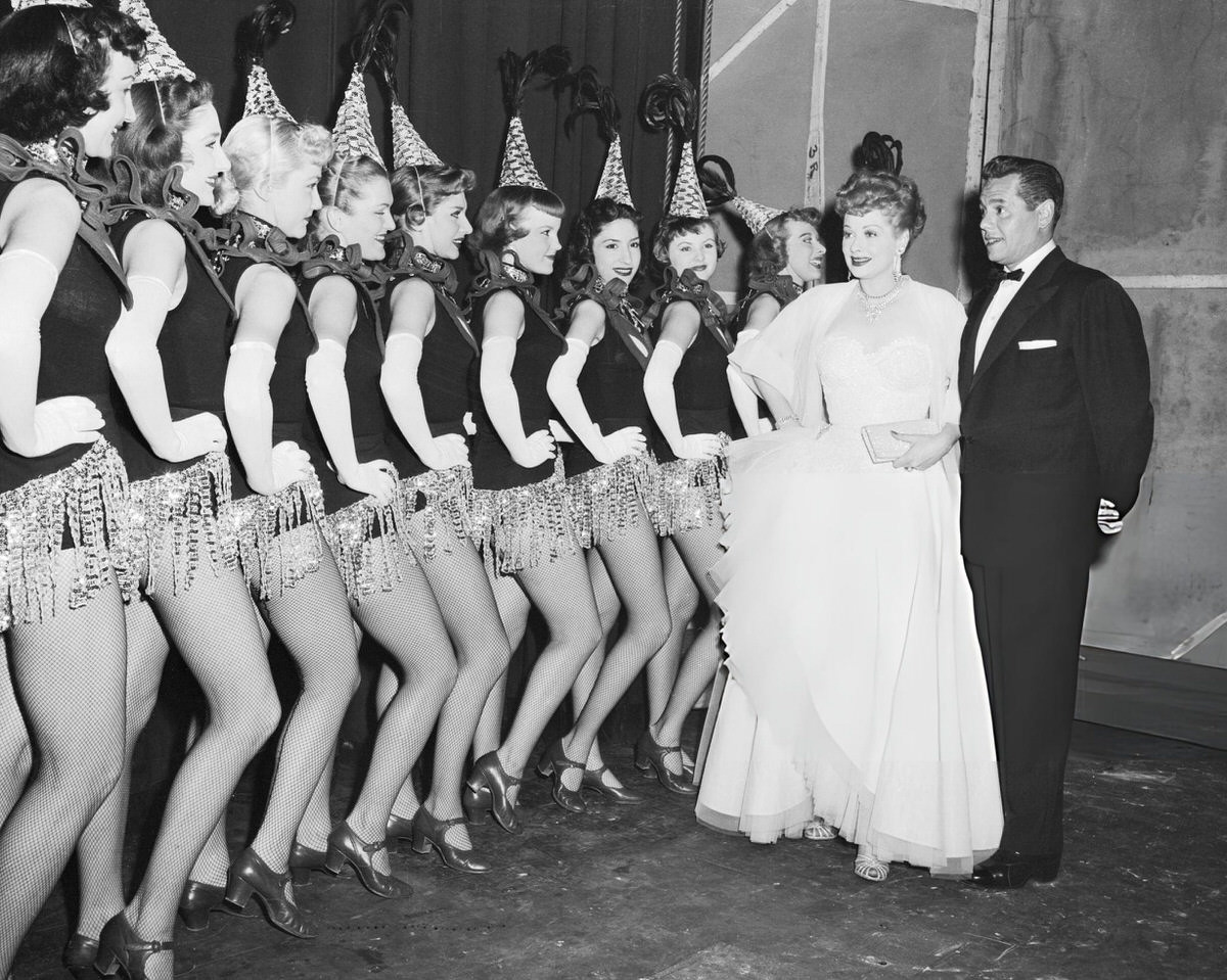 Lucille Ball And Desi Arnaz With The Rockettes Backstage At Radio City Music Hall, New York, 1954.