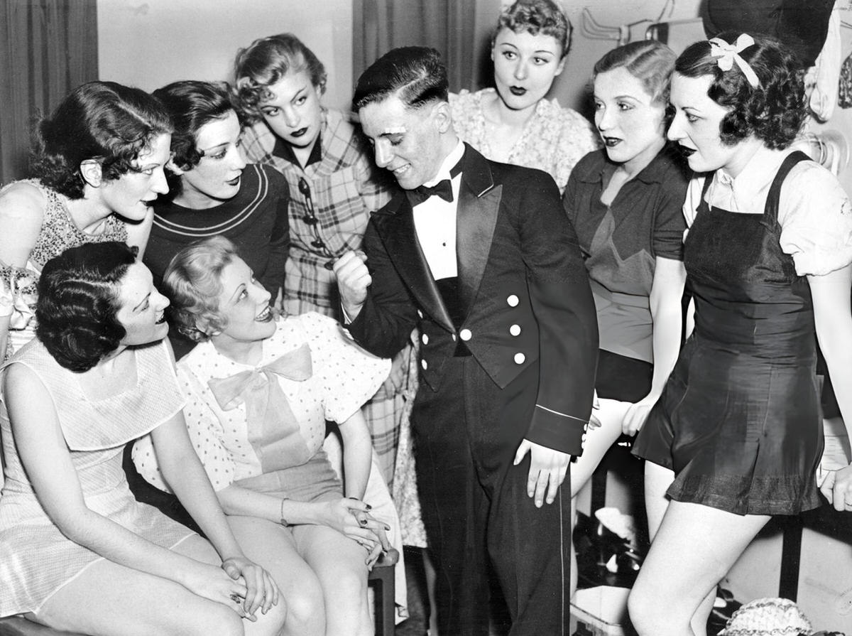 Golden Gloves Winner George Coyle, An Usher At Radio City Music Hall, Speaking With Rockettes, New York, 1935.