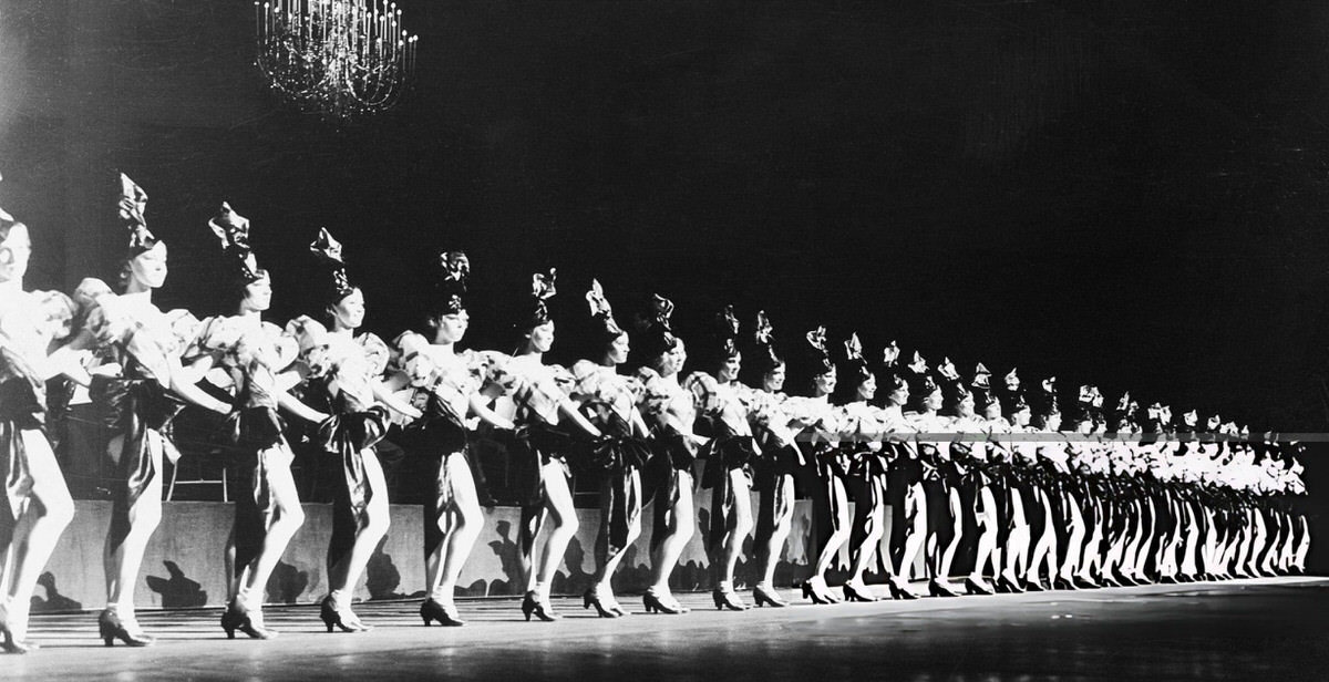 The Rockettes In A Chorus Line On Stage At Radio City Music Hall, New York.