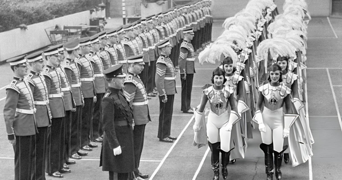 Coldstream Guards Watching The Rockettes On The Radio City Music Hall Roof, New York, 1939.
