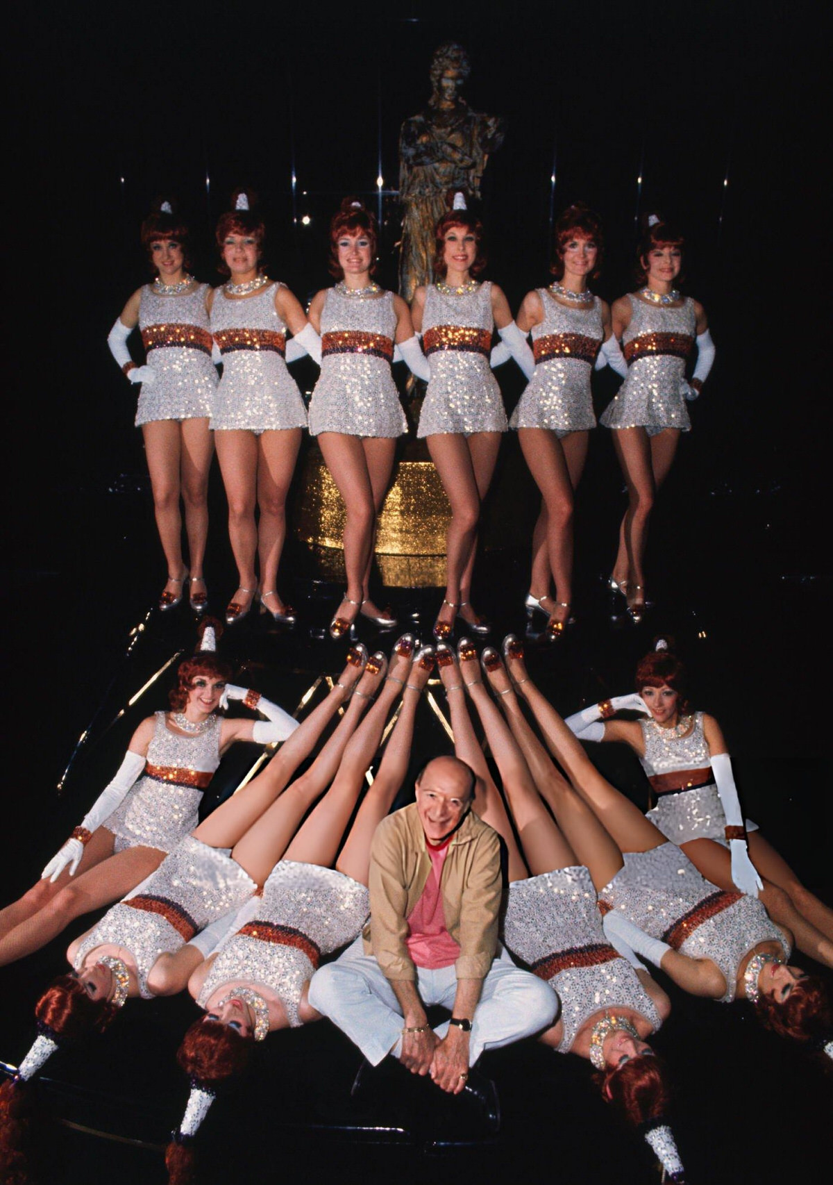 Founder Russell Markert Posing With The Rockettes During A Rehearsal, New York, 1971.