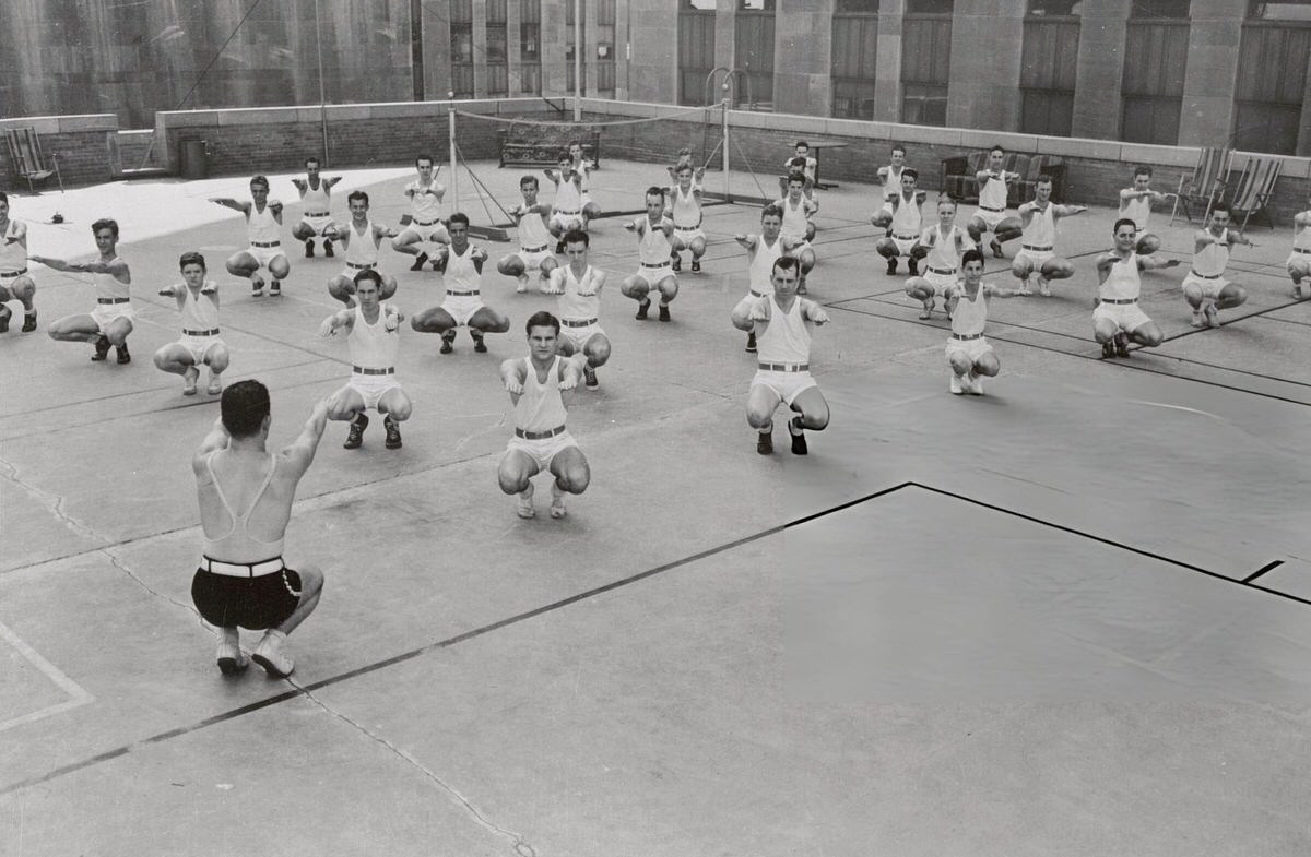 Service Staff Performing Physical Drills On The Radio City Music Hall Sports Roof, New York.