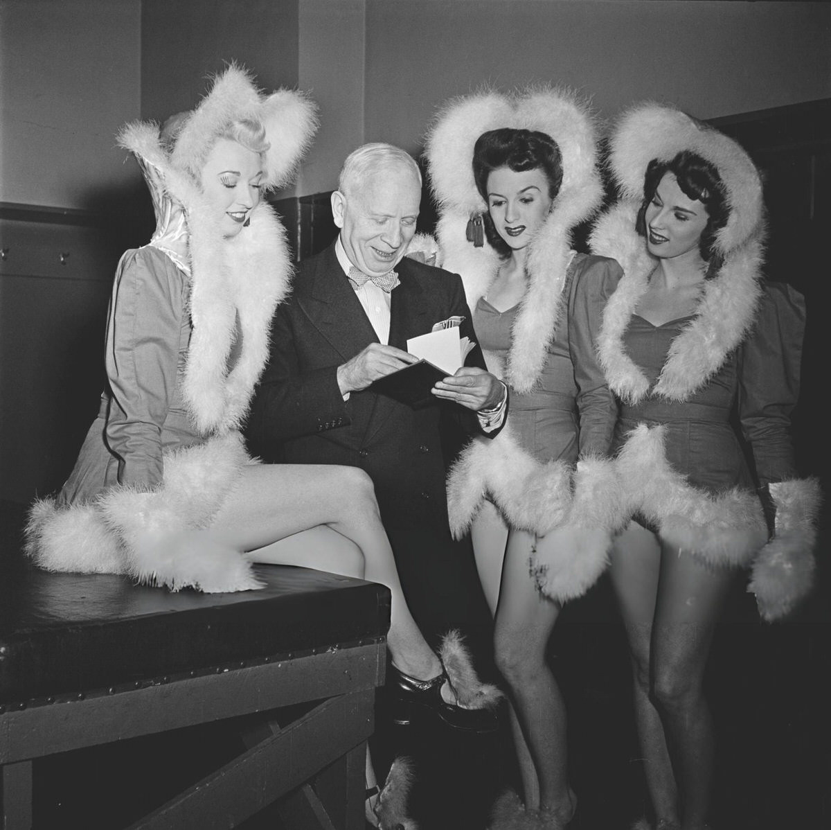 The Rockettes With A Fan Backstage At Radio City Music Hall, New York, 1950.