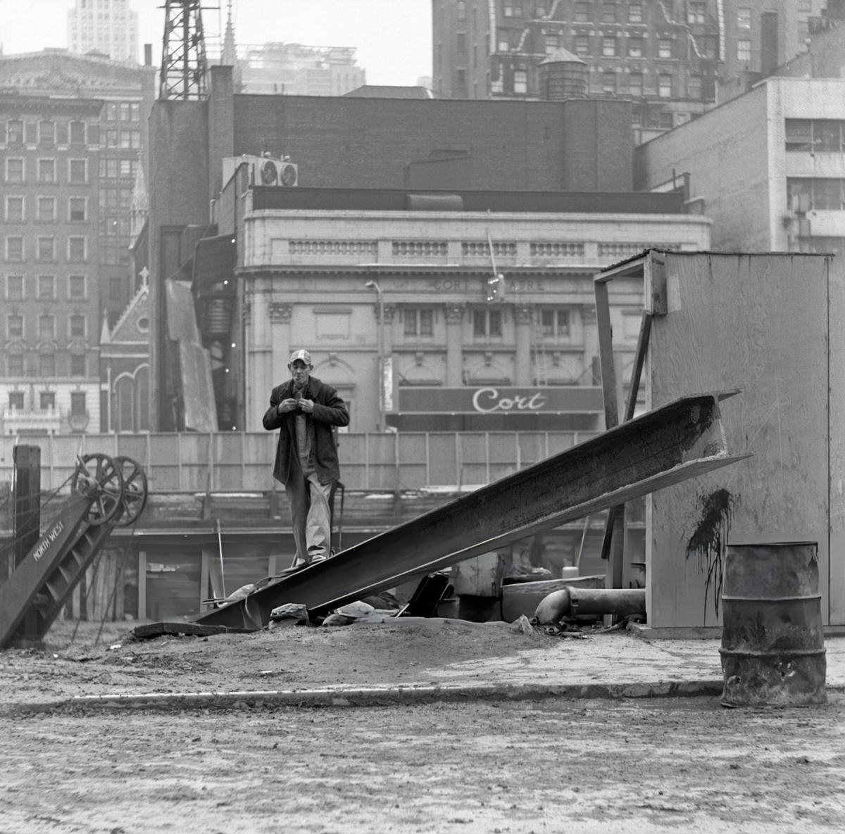 Construction Worker Smoking On A Steel Beam At The Demolition Site Of The Singer Building, Downtown Manhattan, 1969.