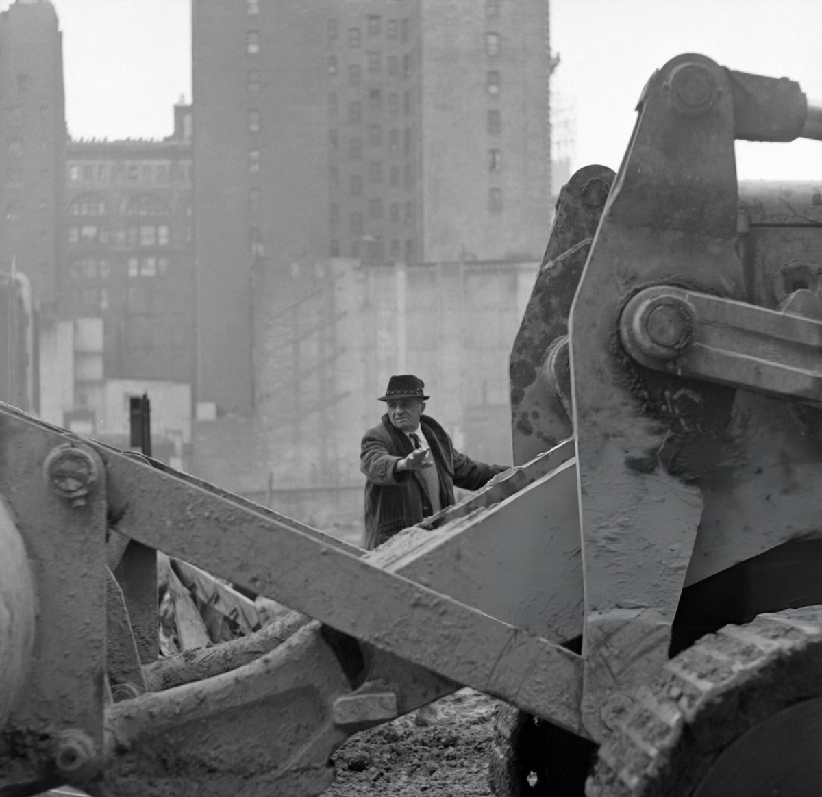 Construction Foreman Inspecting A Bulldozer During The Demolition Of The Singer Building, Downtown Manhattan, 1969.