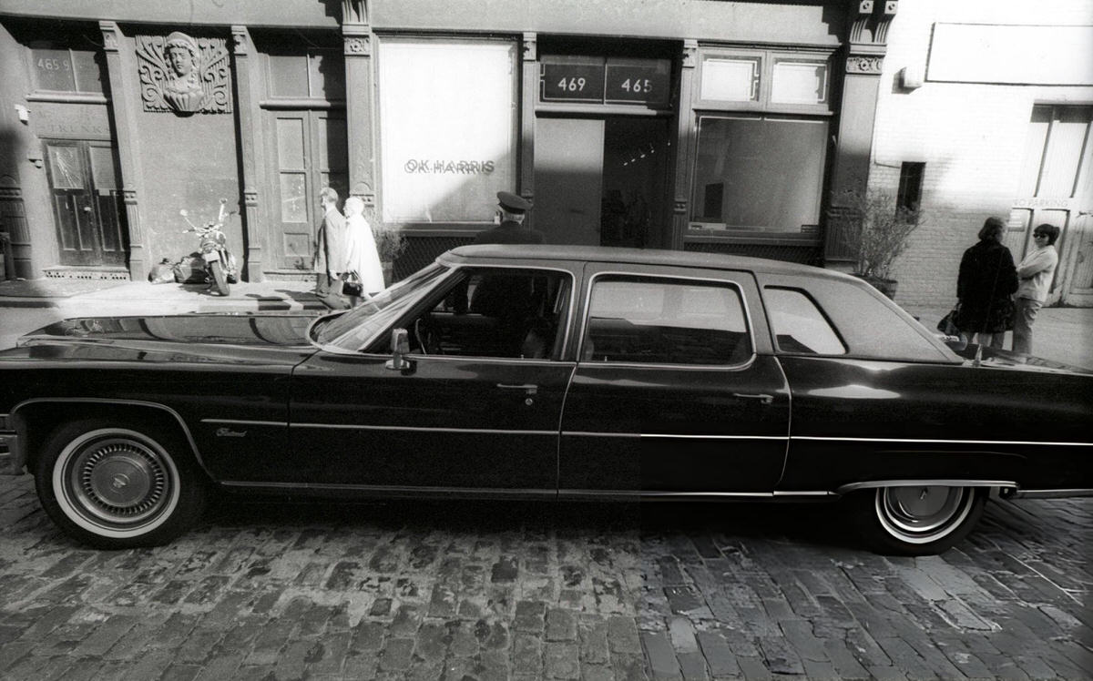Chauffeur Standing By A Car Outside The Ok Harris Gallery On West Broadway, Soho, 1974.