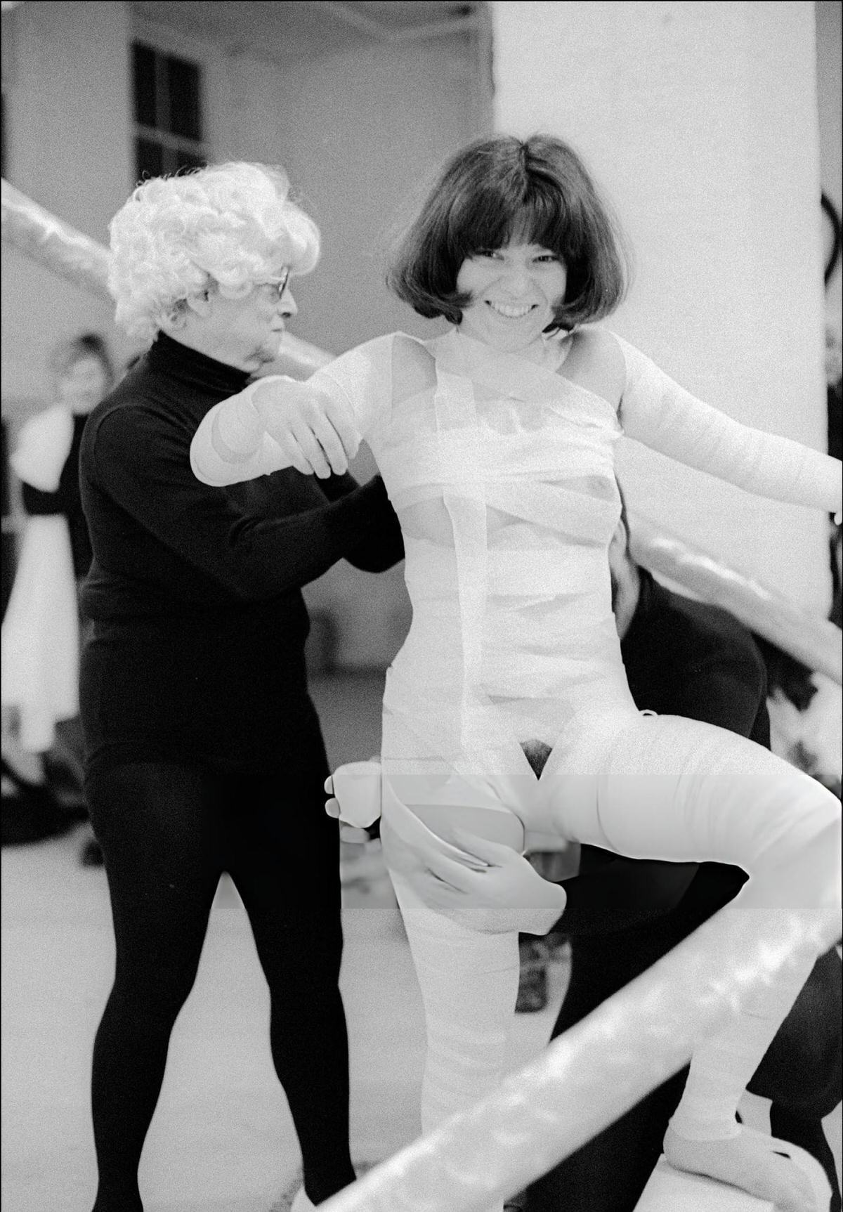 Lil Picard Wrapping A Participant For A Performance Piece At The Sculpture Now Gallery, Soho, 1974.