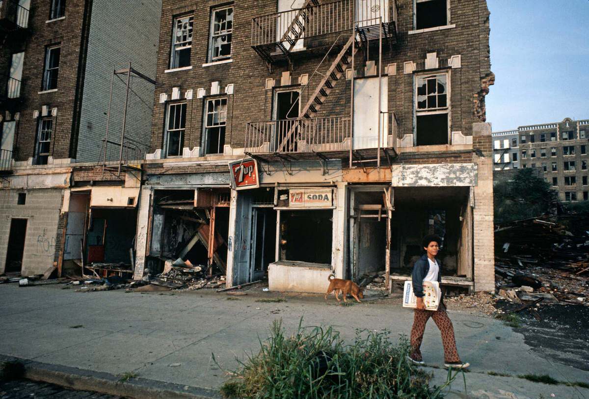 Abandoned Burnt-Out Tenement Blocks And Shops, South Bronx, 1977.