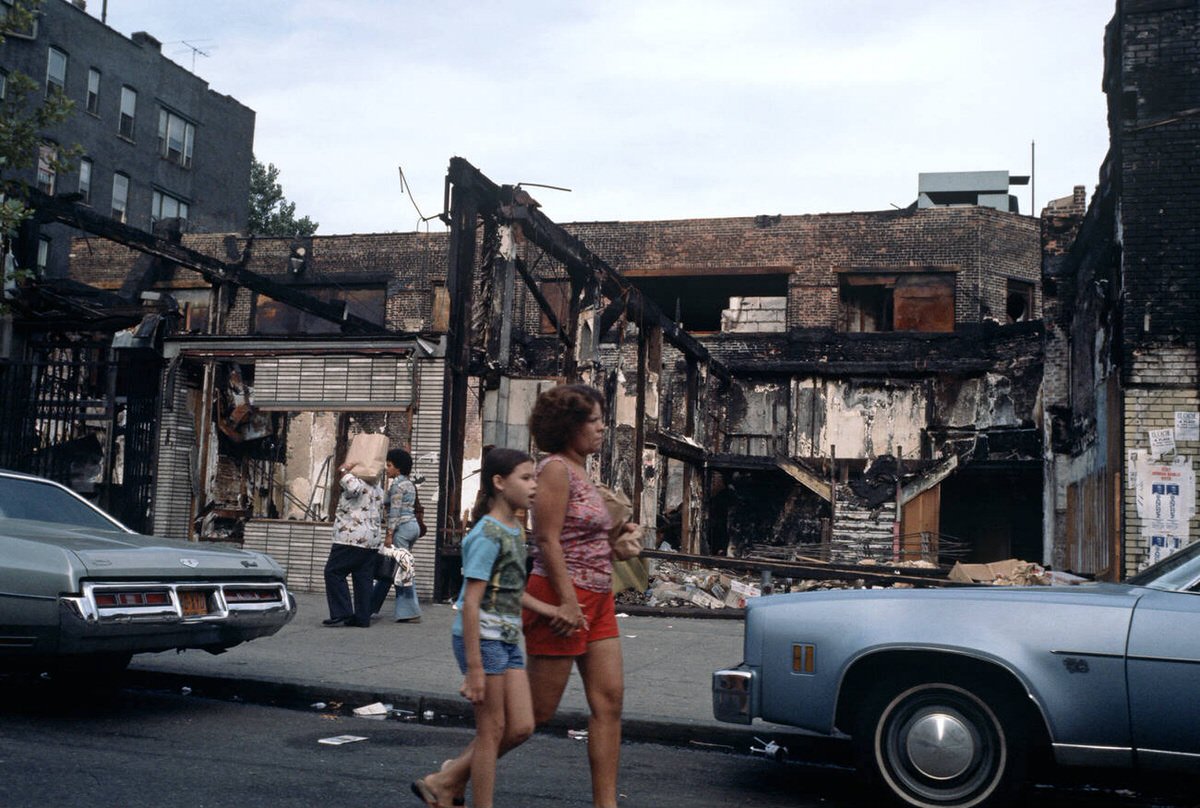 Abandoned Burnt-Out Tenement Blocks And Shops, South Bronx, 1977.