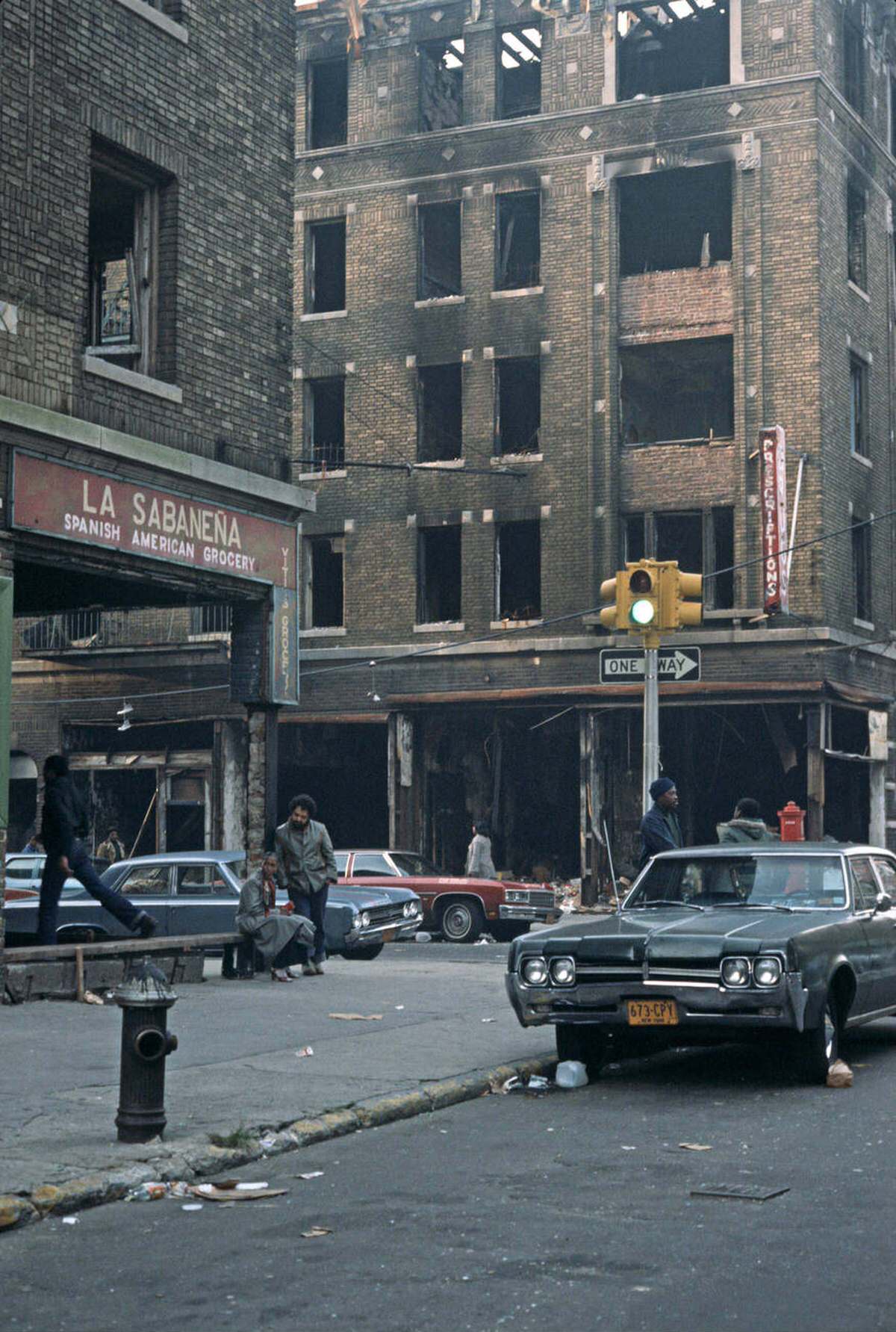 Abandoned Burnt-Out Tenement Blocks And Shops, South Bronx, 1977.