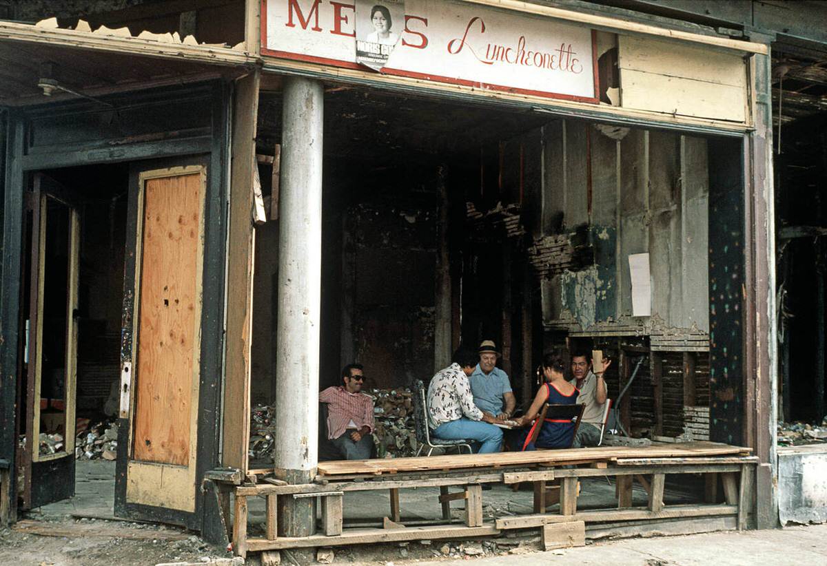 Residents Playing Cards In An Abandoned Luncheonette, South Bronx, 1977.