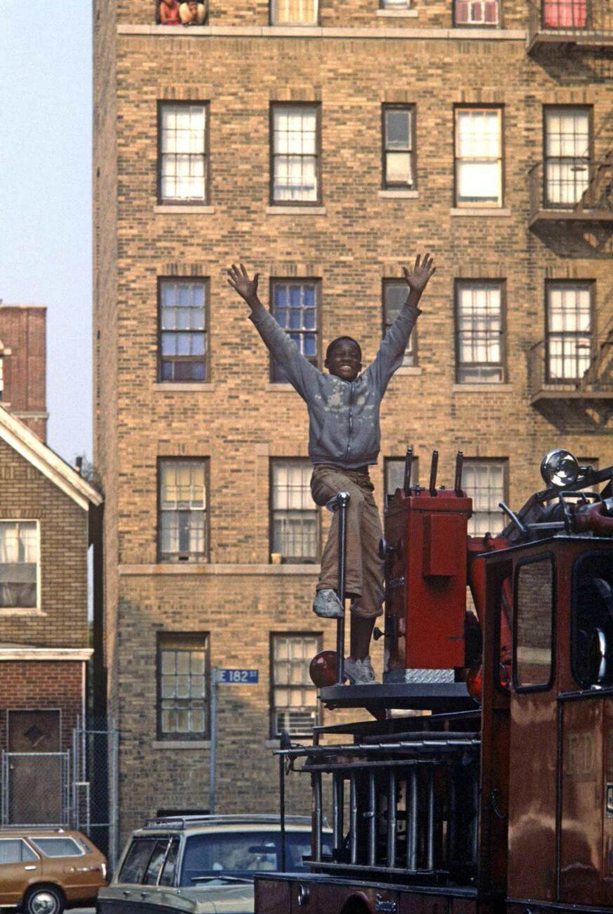 Boy On A Fire Engine, South Bronx, 1977.