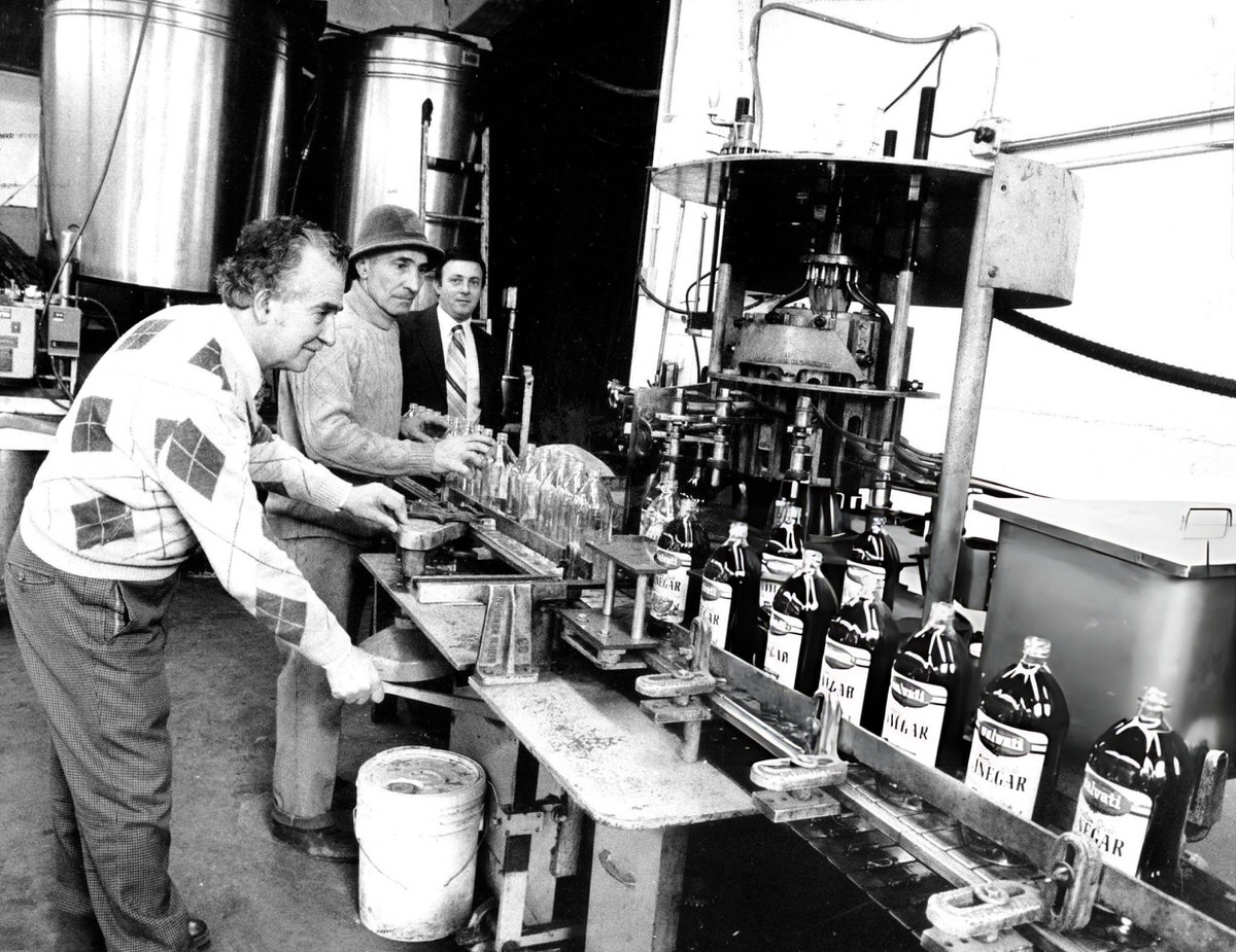 Joseph Salvati And Family Members Operating A Vinegar Assembly Line In A South Bronx Plant, 1982.