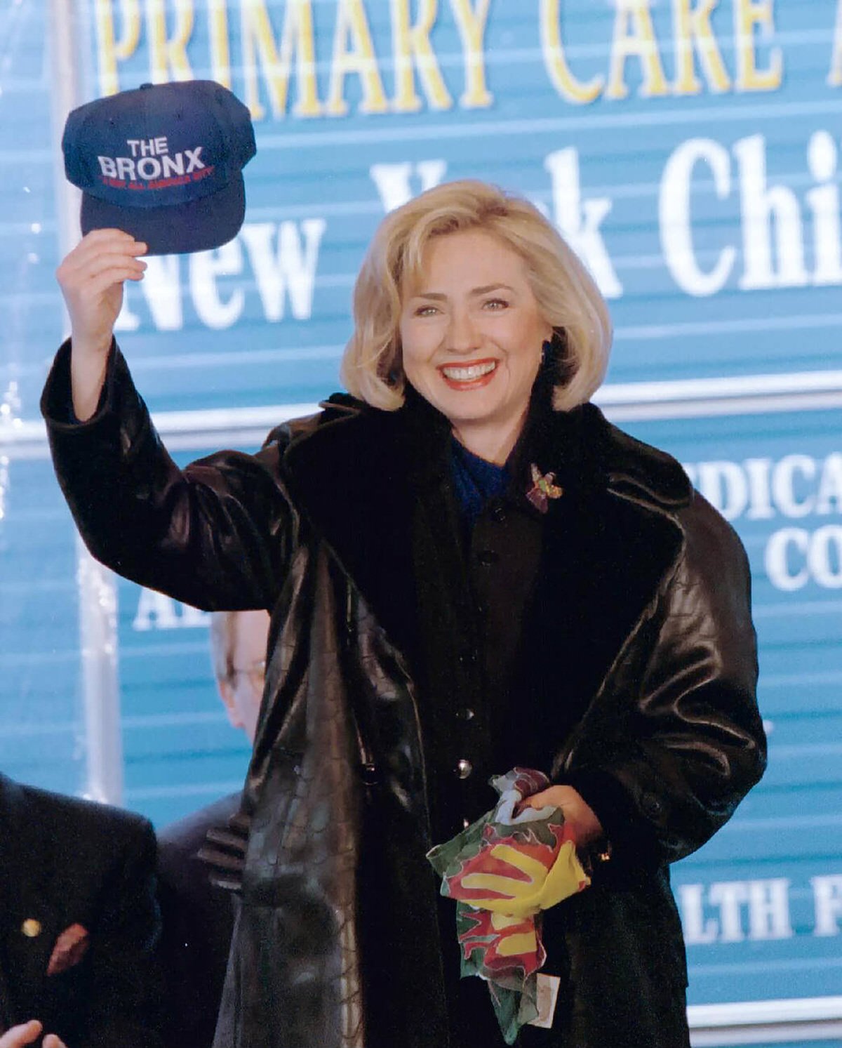 Hillary Clinton Holding A Bronx Baseball Cap While Visiting The South Bronx Children'S Health Center At 911 Longwood Avenue, 1997.