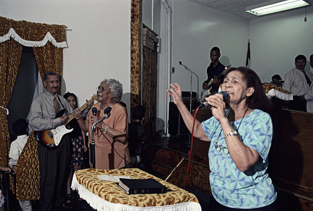Pura And Juana Singing At Senda De Bendicion, 506 Brook Avenue, South Bronx, 2001.