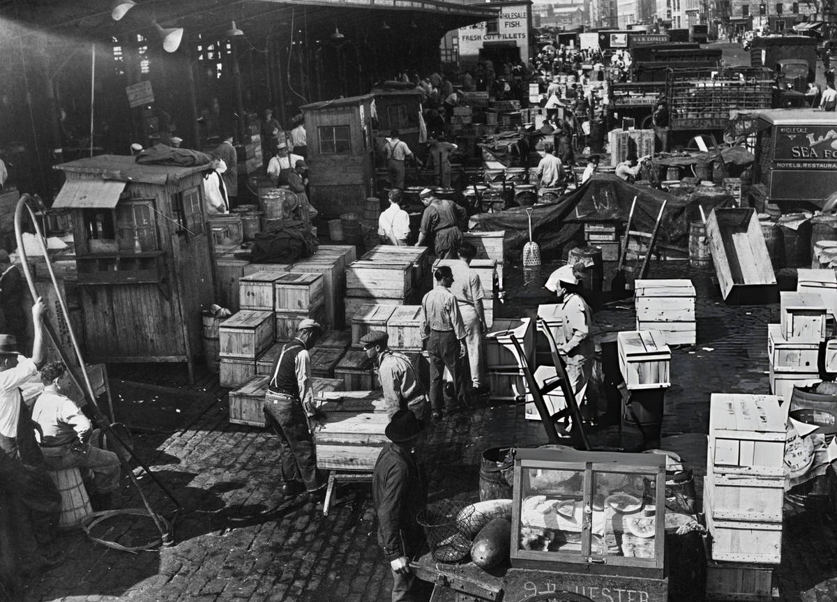 Porters And Traders Among Stalls At The Fulton Fish Market, South Street Seaport, 1925.
