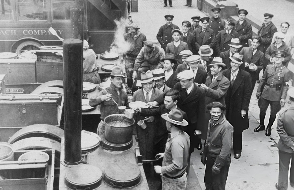 Reforestation Service Recruits Receiving A Meal From An Army Soup Kitchen On South Street, New York, 1933.