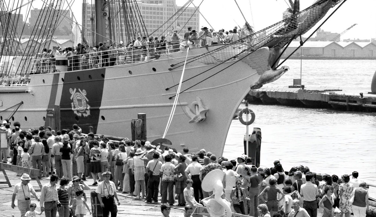 Crowds Waiting To Board The Coast Guard Eagle At The South Street Seaport Museum, 1976.