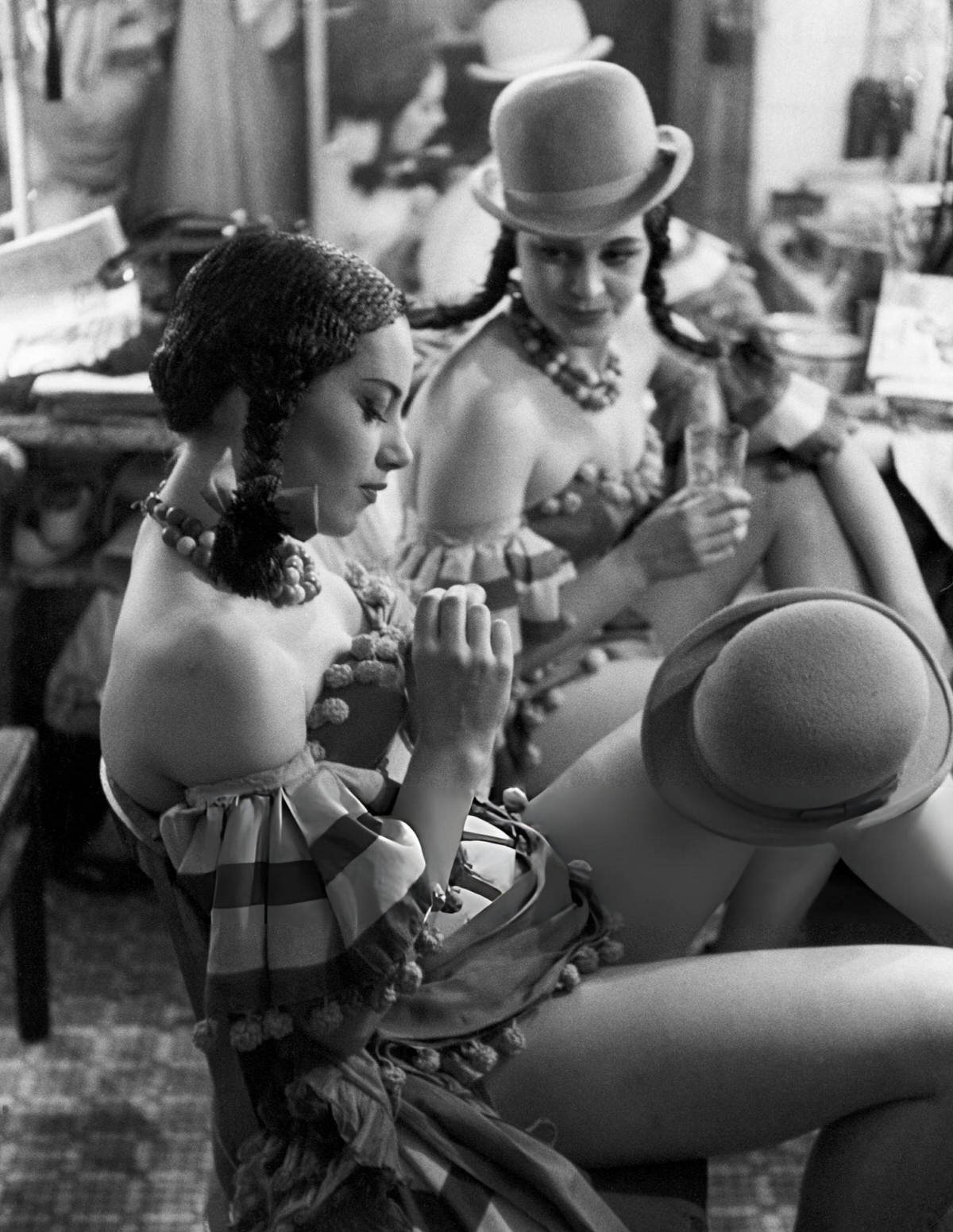 Dancers In Costume Relaxing Between Shows At The Copacabana, New York.