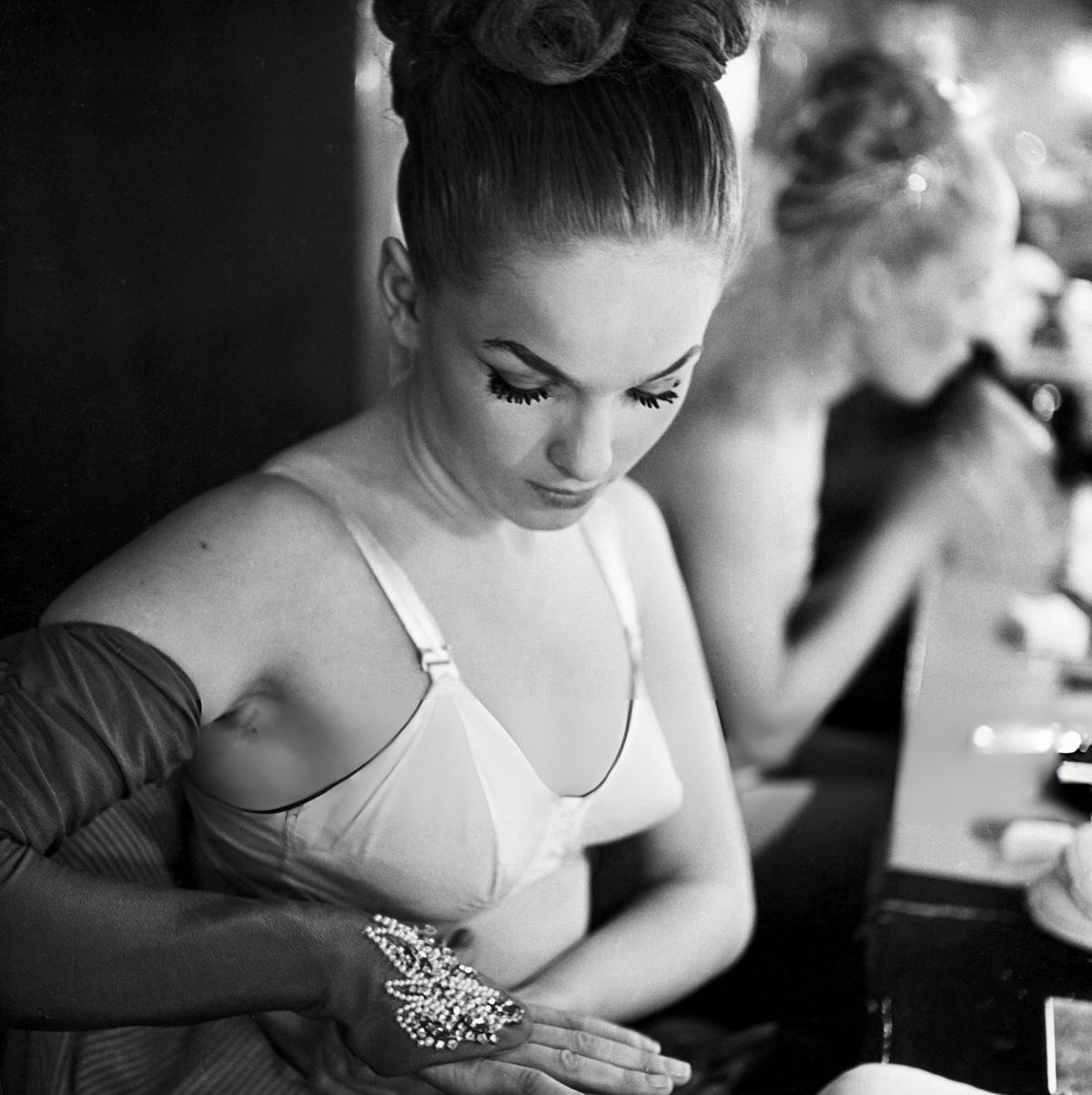 Dancer Preparing For A Show In Her Dressing Room At The Copacabana, New York.