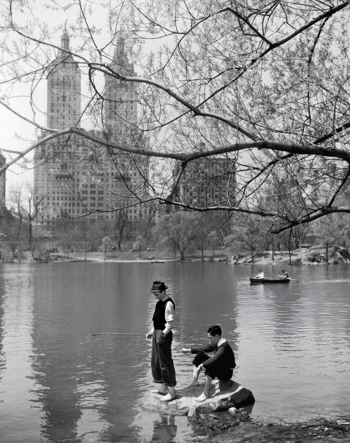 Boys Fishing In Central Park Lake With The San Remo In The Background, 1940.