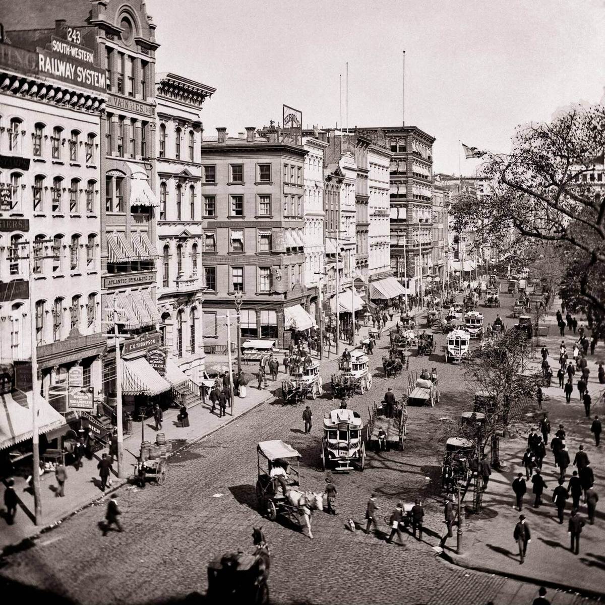 Pedestrians And Horse-Drawn Wagons On Lower Broadway Looking North From City Hall Park, New York, 1890.