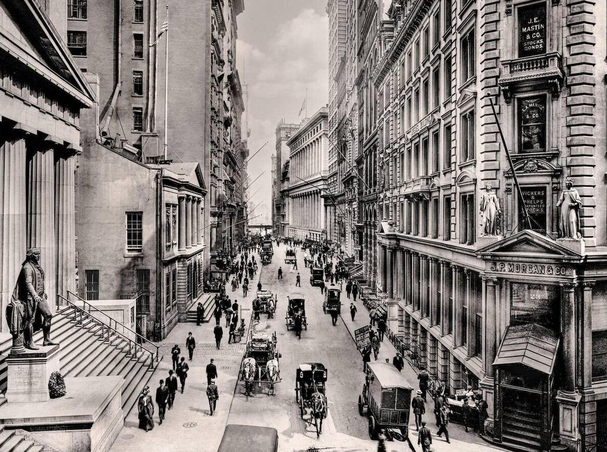 Horse-Drawn Carriages And Pedestrians Near The Stock Exchange And Jp Morgan And Co. On Wall Street, New York, 1900.