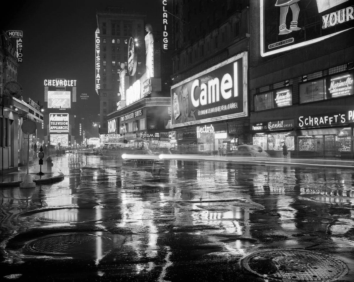 Rainy Streets Of Times Square At Night With Neon Advertising Signs, New York, 1953.