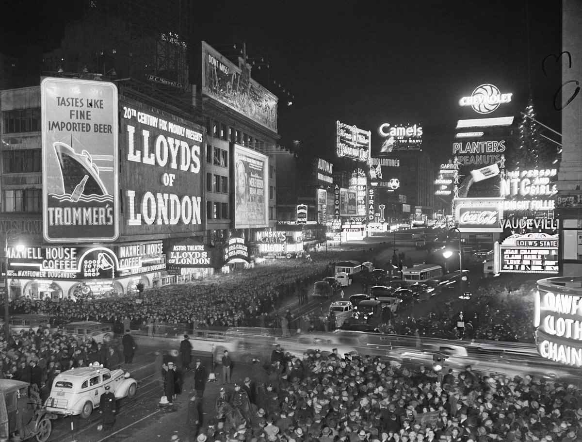 Times Square Looking North As Crowds Gather On The Great White Way To Welcome The New Year, New York, 1936.