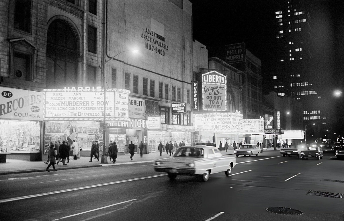 Neon-Lighted Restaurants And Movie Theaters On 42Nd Street Near Eighth Avenue, New York.