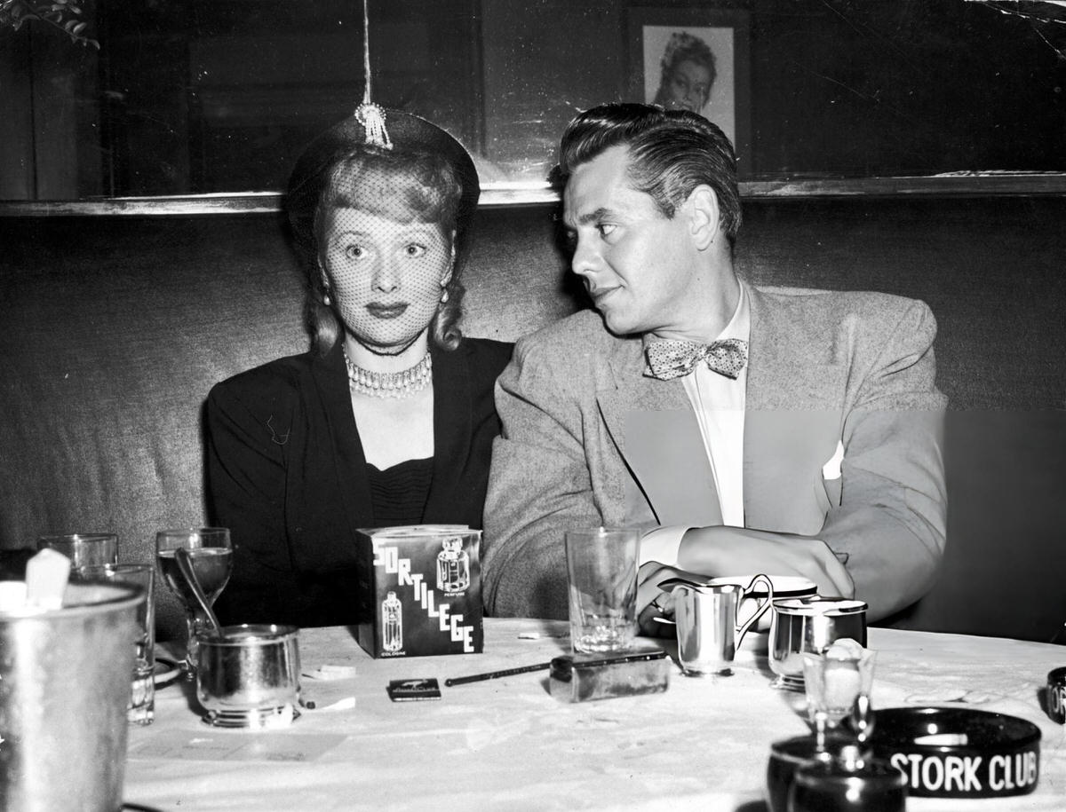 Lucille Ball And Desi Arnaz With A Bottle Of Sortilege Perfume At The Stork Club, New York, 1945.