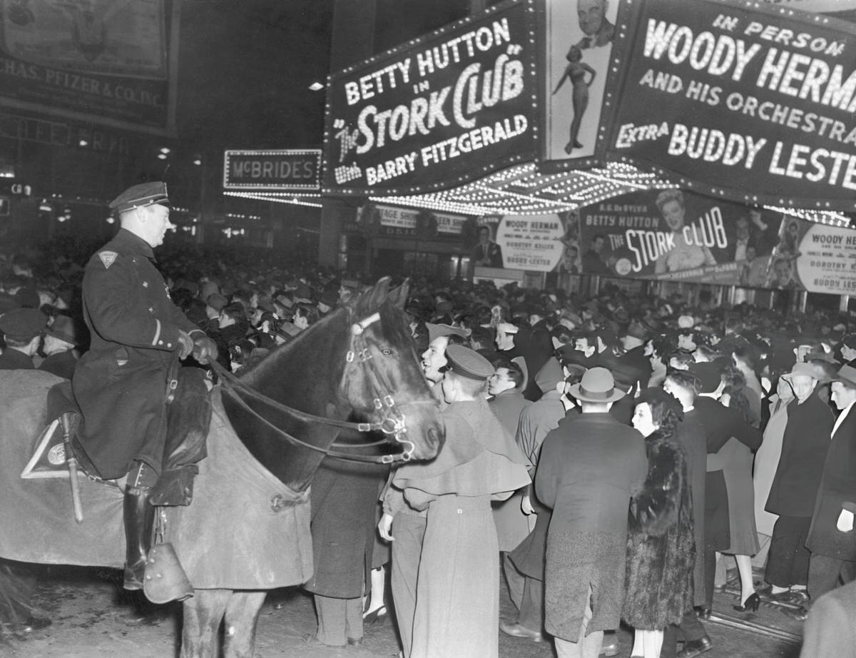 Crowds Under A Marquee For The Film The Stork Club In Times Square On New Year'S Eve, New York, 1946.