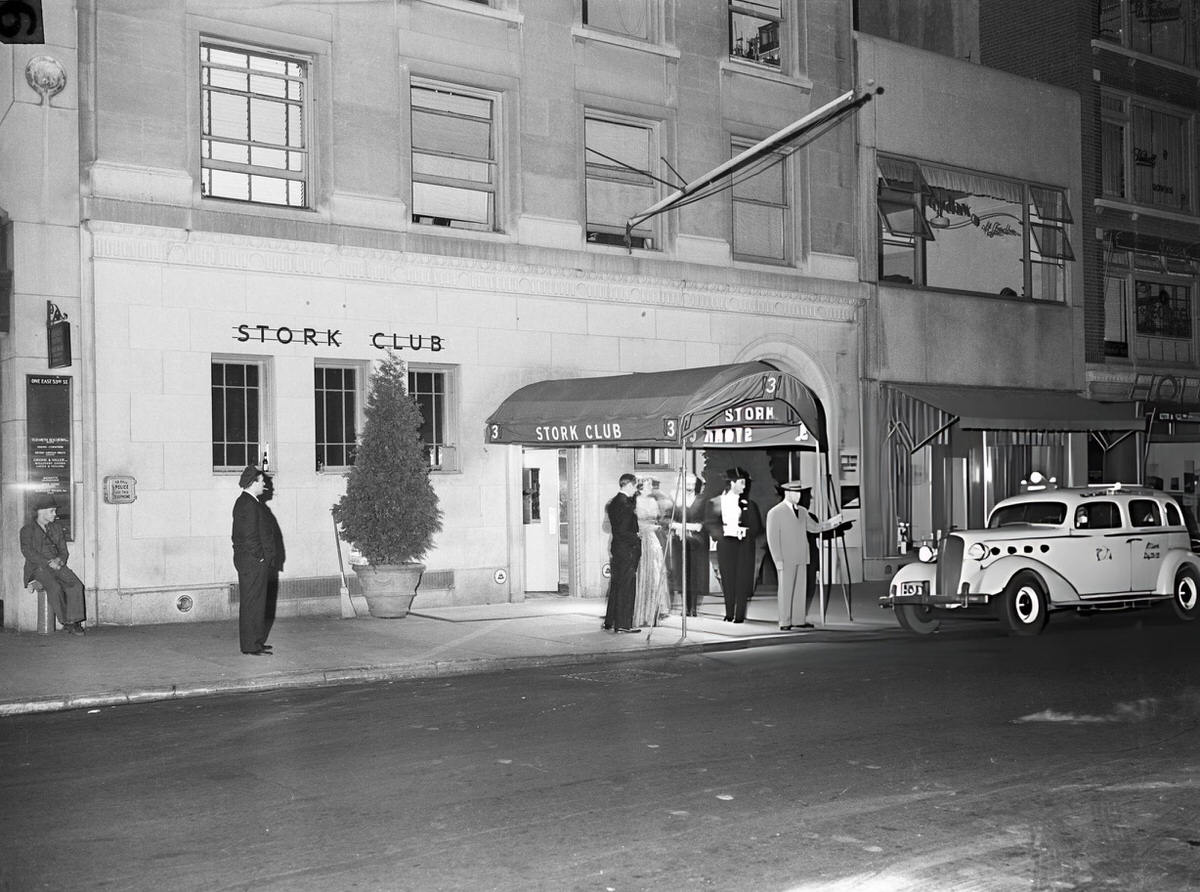 Taxi Arriving At The Entrance Of The Stork Club, New York.