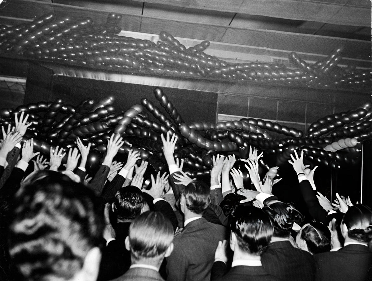 Young Men Reaching For Balloons During A Balloon Night Party At The Stork Club, New York, 1940S.