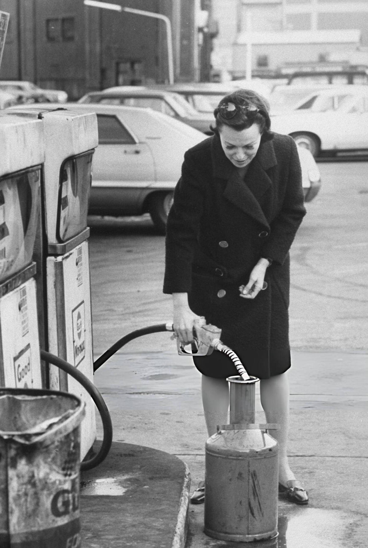 Commissioner Of Consumer Affairs Bess Myerson Refueling A Car At A Gas Station, New York, 1970S.