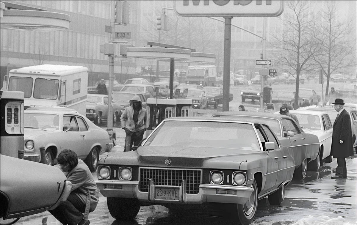 People Waiting In Line At A Gas Station During The Arab Oil Embargo, New York, 1974.