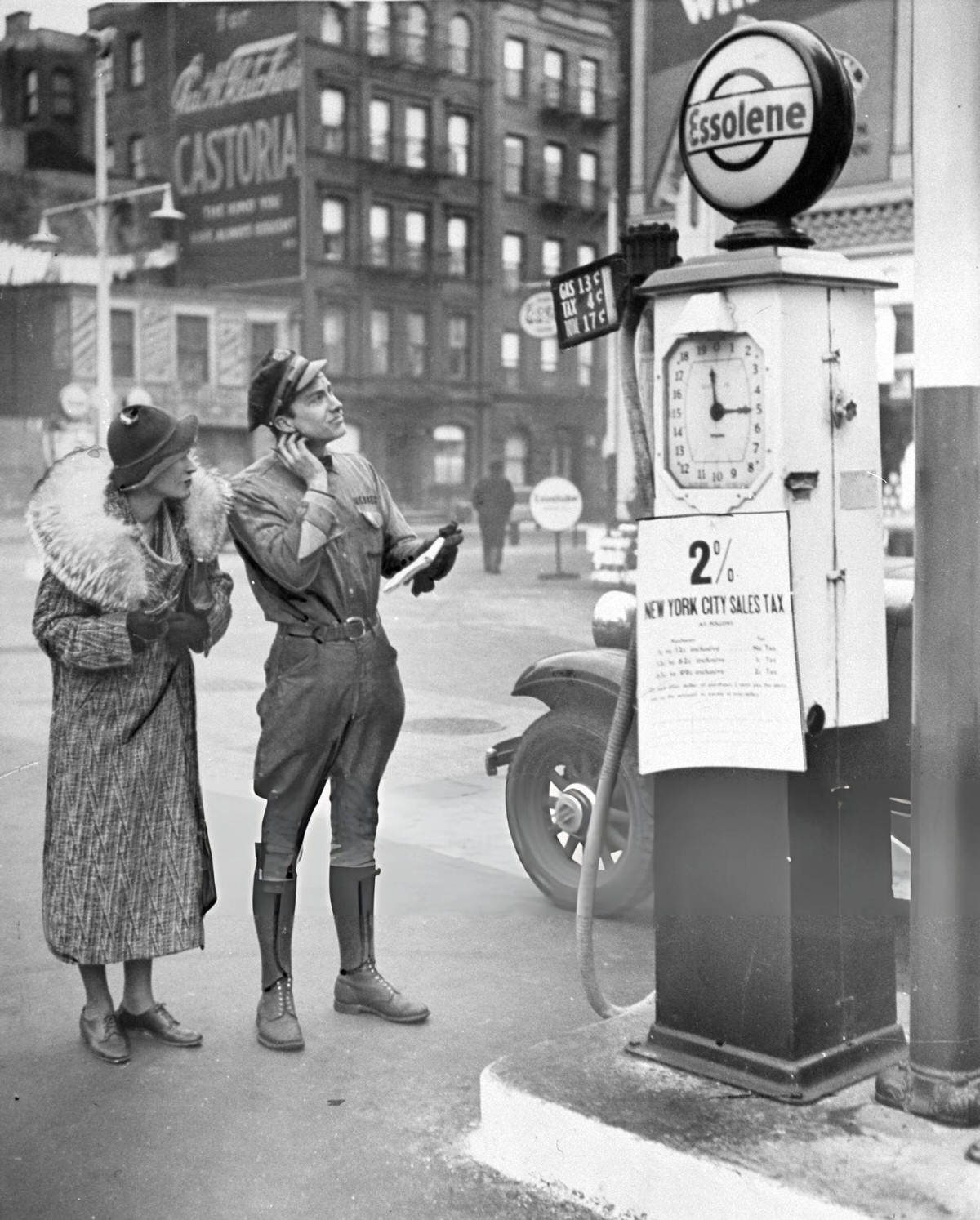 Gas Station Manager Ed Berry Calculating The New City Sales Tax At First Avenue And 24Th Street, New York, 1934.