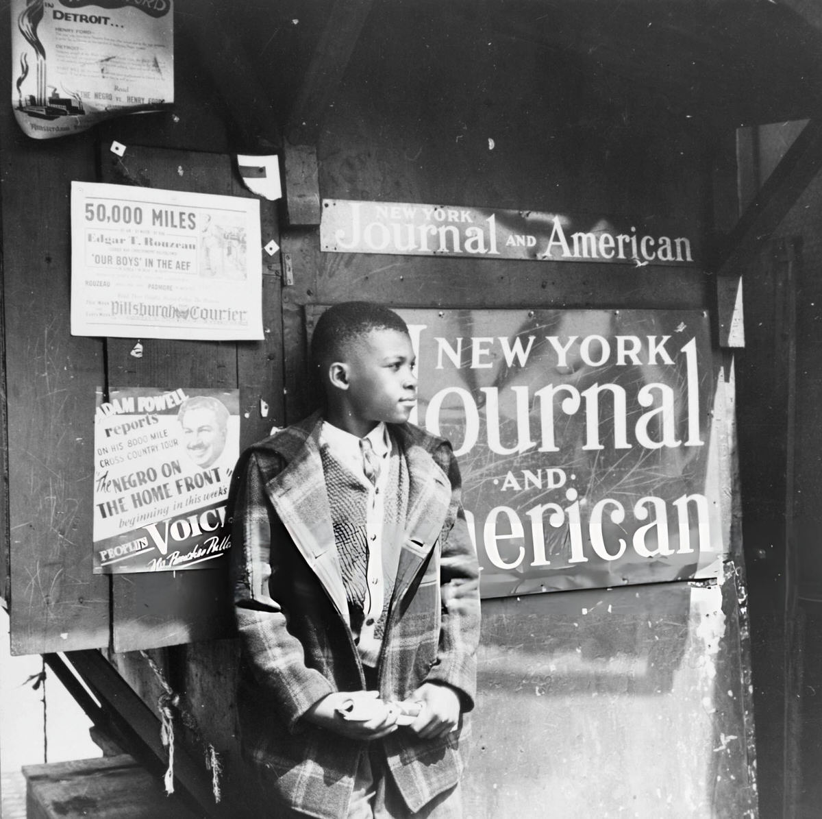 Newsboy In Harlem, New York, 1943.