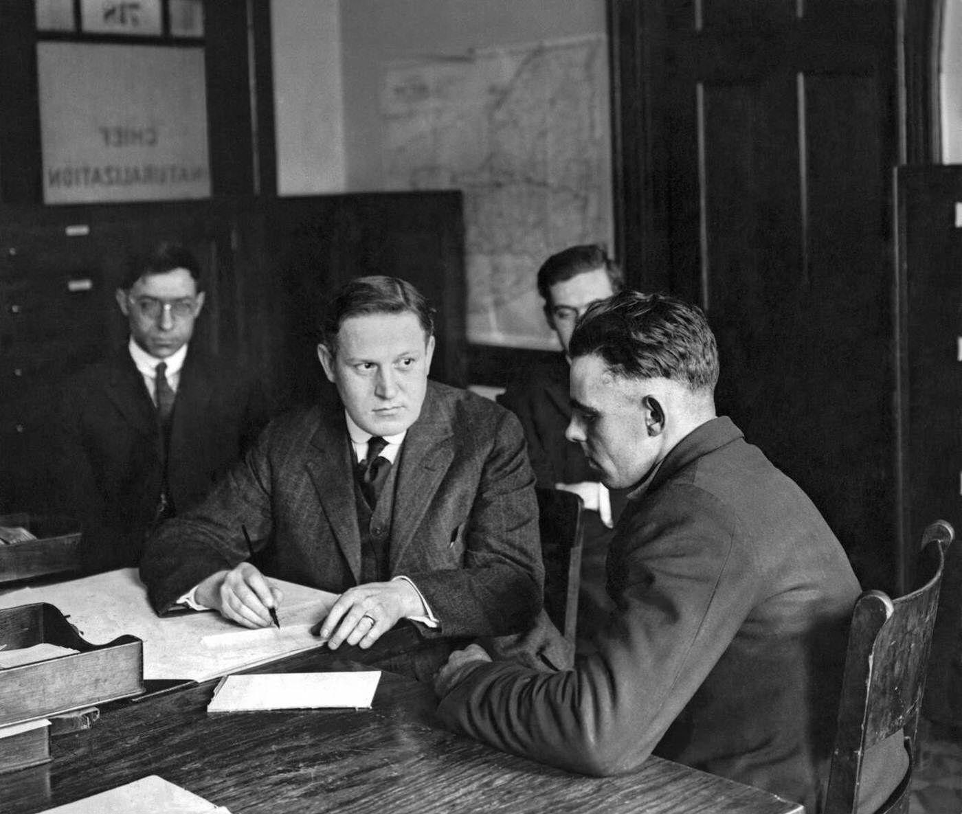 Immigrant Being Examined At The Naturalization Office On Ellis Island, 1916